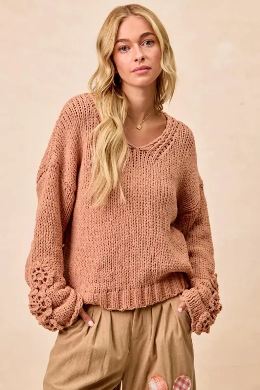 BiBi Chunky Knit Sweater with Flower Detail Sleeves sold by Charming Charlie