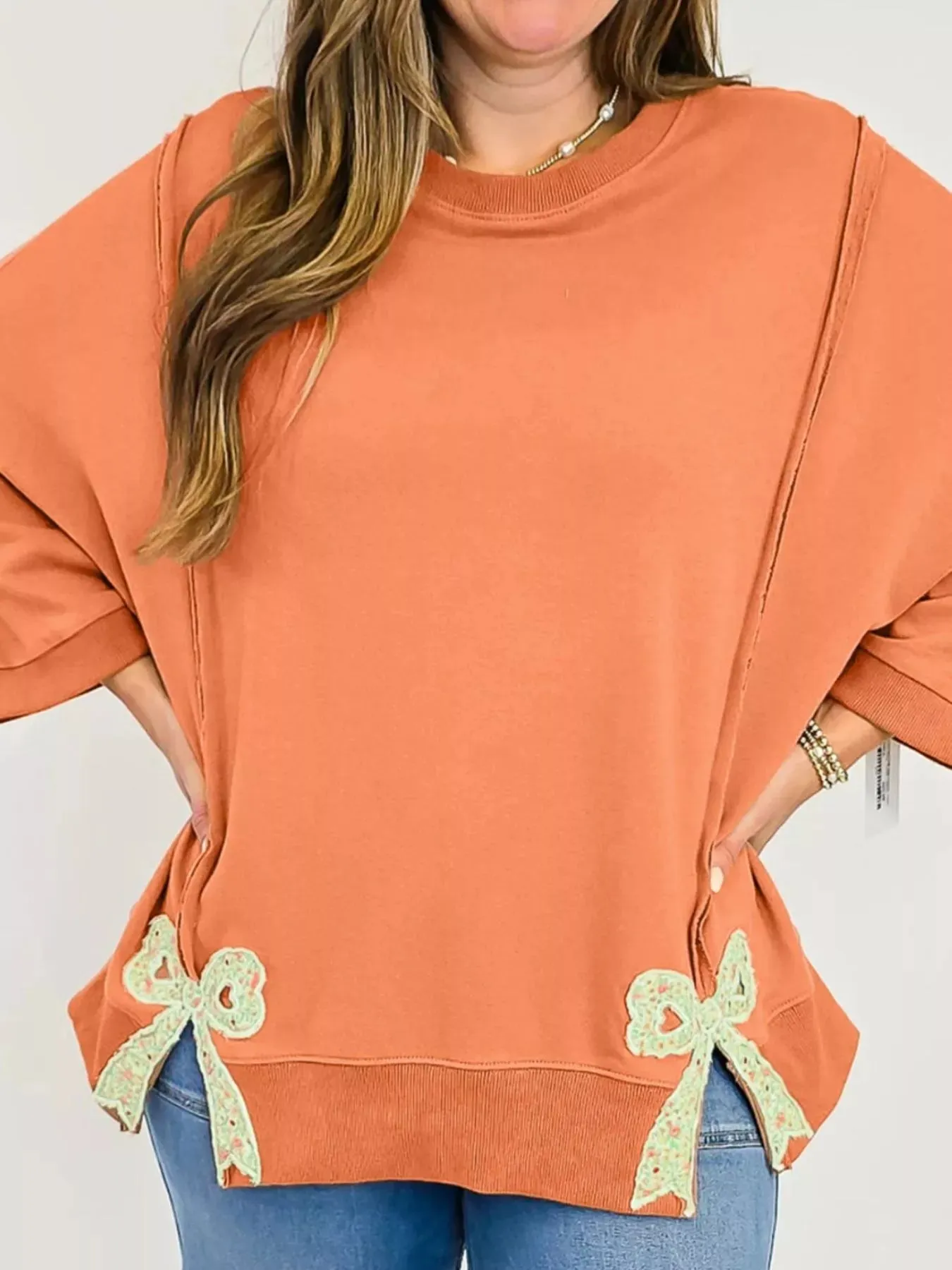 Bow Slit Round Neck Sweatshirt sold by Charming Charlie product image thumbnail 4