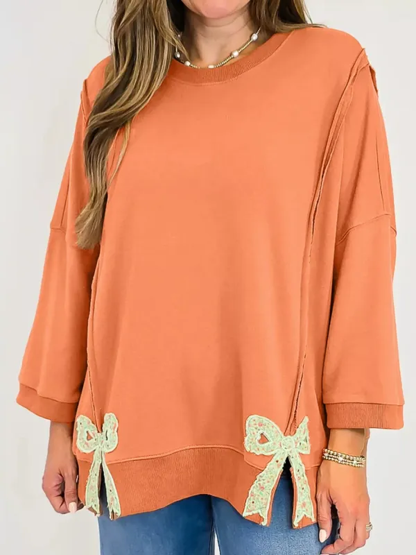 Bow Slit Round Neck Sweatshirt sold by Charming Charlie