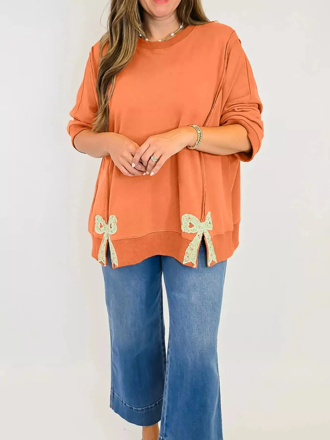 Bow Slit Round Neck Sweatshirt sold by Charming Charlie product image thumbnail 3