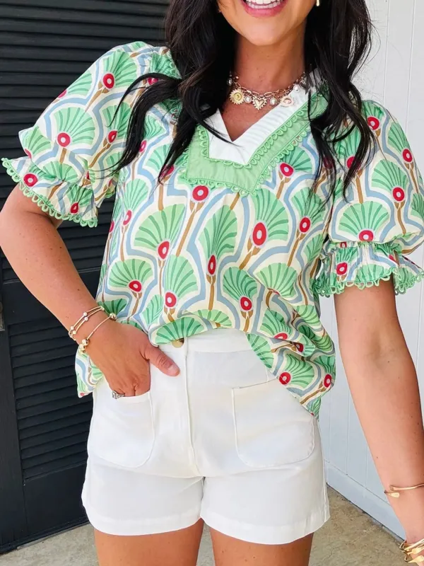 Printed V-Neck Flounce Sleeve Blouse sold by Charming Charlie