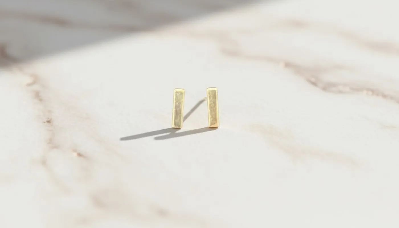 Sleek Gold Bar Earrings sold by Charming Charlie