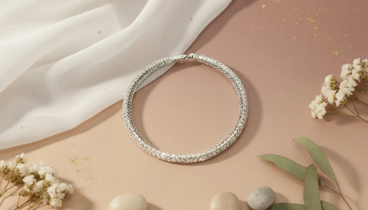 Woven Silver Necklace with a Refined Shine sold by Charming Charlie