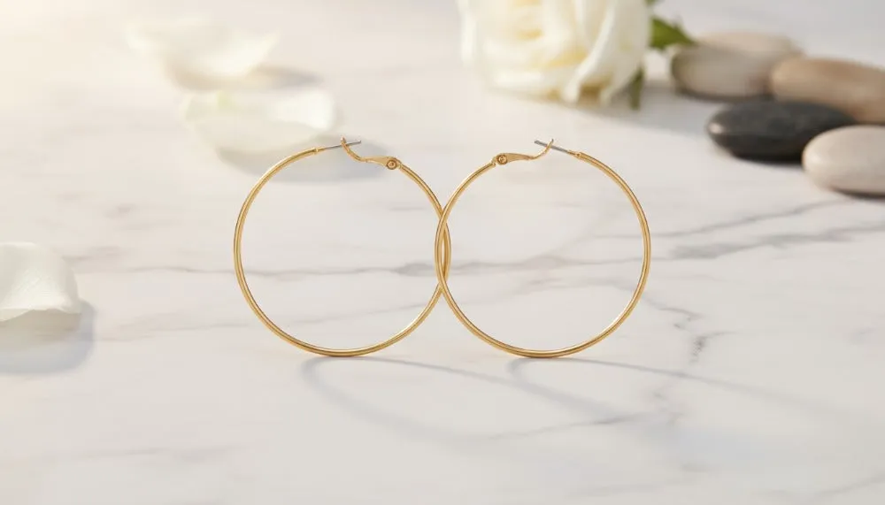 Gold Thin Dangle Hoop Earrings sold by Charming Charlie