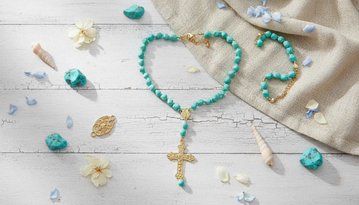 Turquoise Bead Rosary-Style Necklace with Gold Cross Pendant sold by Charming Charlie