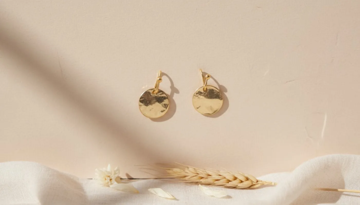 Golden Aura Stud Earrings sold by Charming Charlie