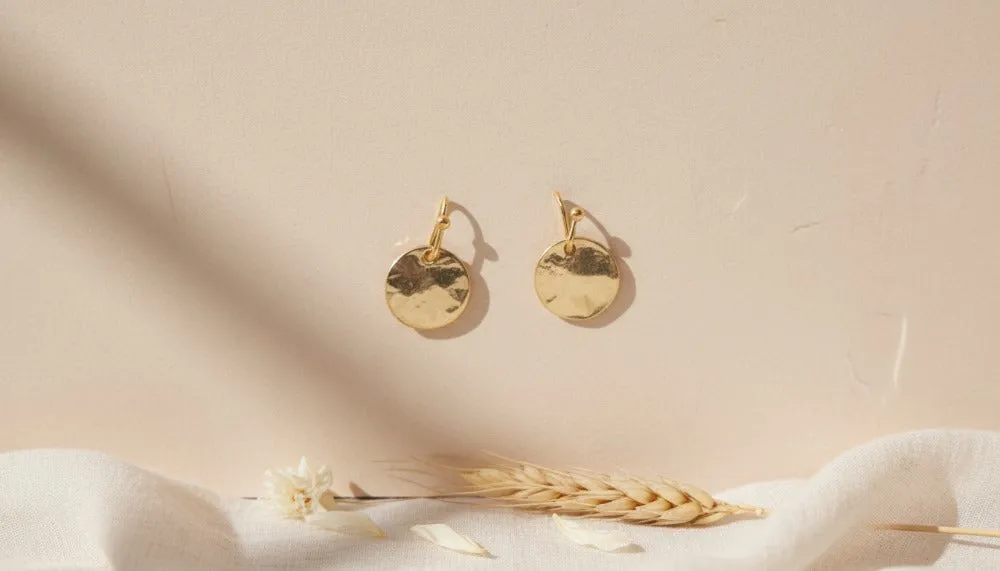 Golden Aura Stud Earrings sold by Charming Charlie