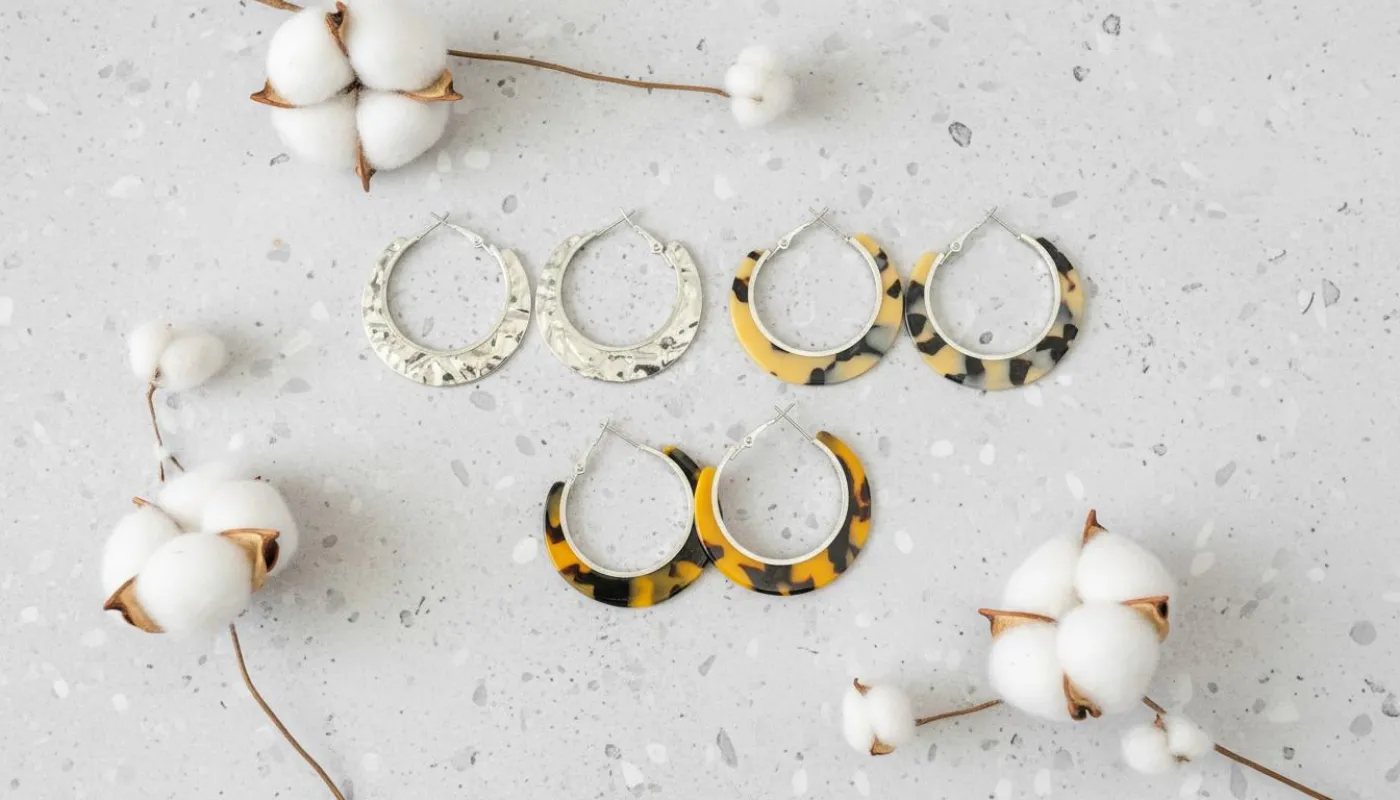 Bold Tortoise Hoop Earrings sold by Charming Charlie