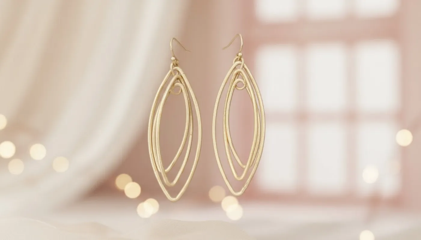 Gold Oval Interlocking Hoop Dangle Earrings sold by Charming Charlie