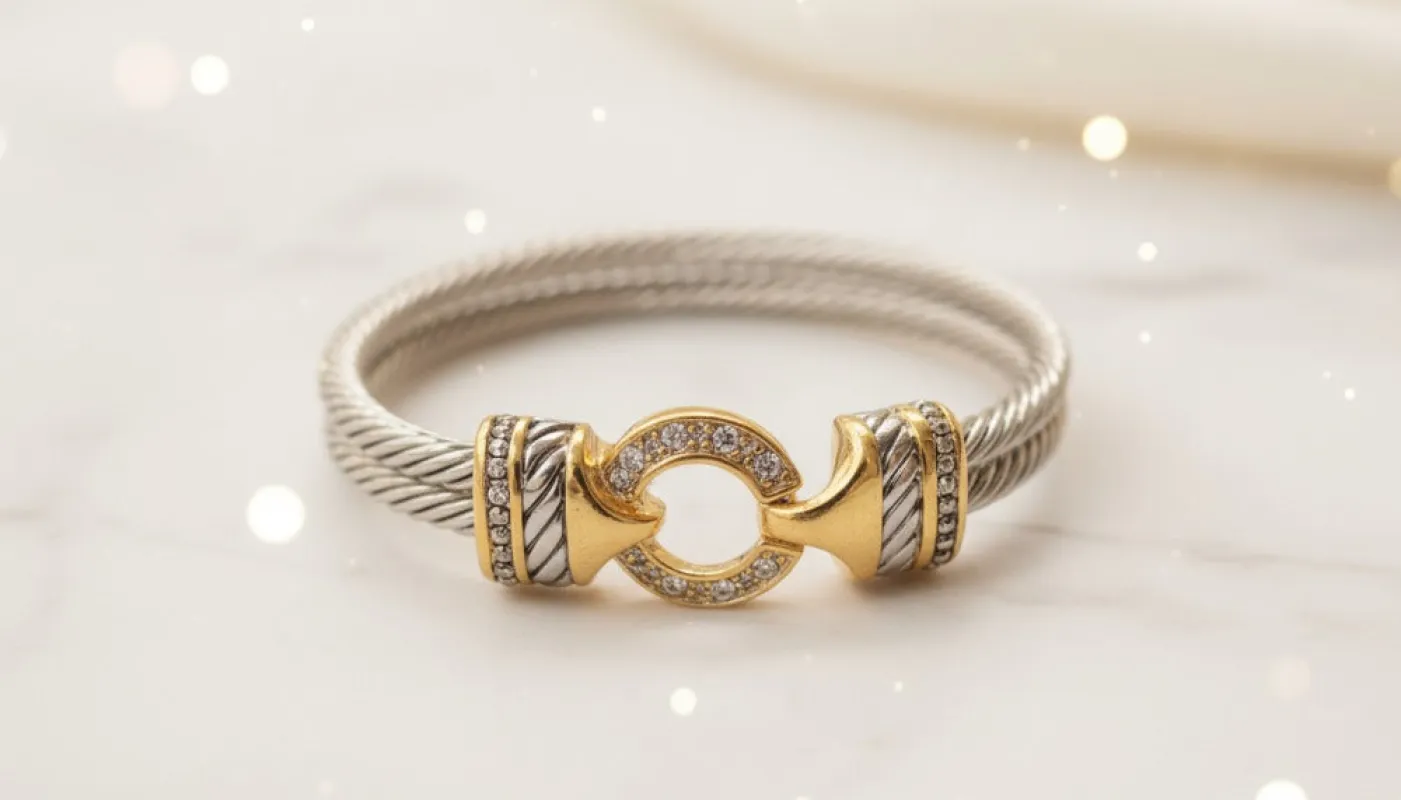 Two-Tone Cable Bracelet with Crystal-Studded Clasp sold by Charming Charlie