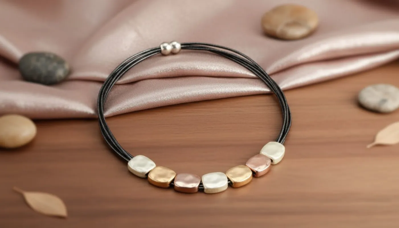 Metallic Mosaic Necklace sold by Charming Charlie