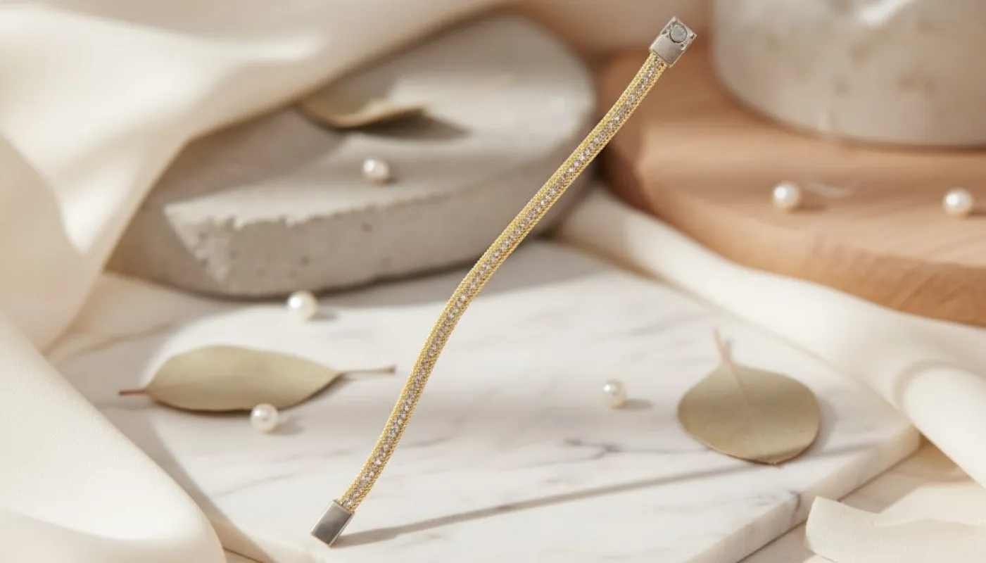 Gold Mesh Bracelet sold by Charming Charlie