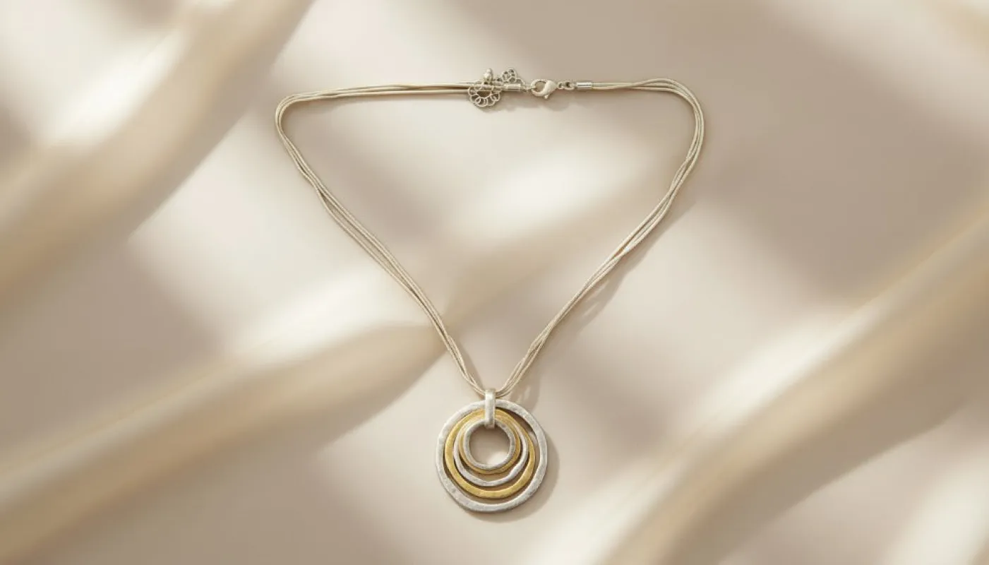 Dual-Tone Rings Necklace sold by Charming Charlie