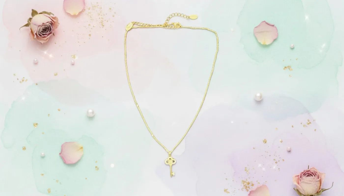 Golden Key Pendant Necklace made by Charming Charlie