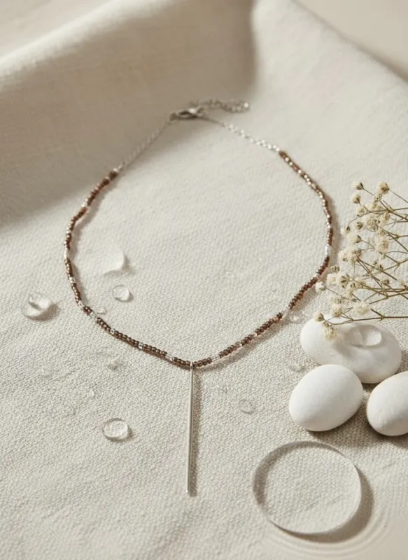 Brown Beads with Silver Accent Necklace sold by Charming Charlie