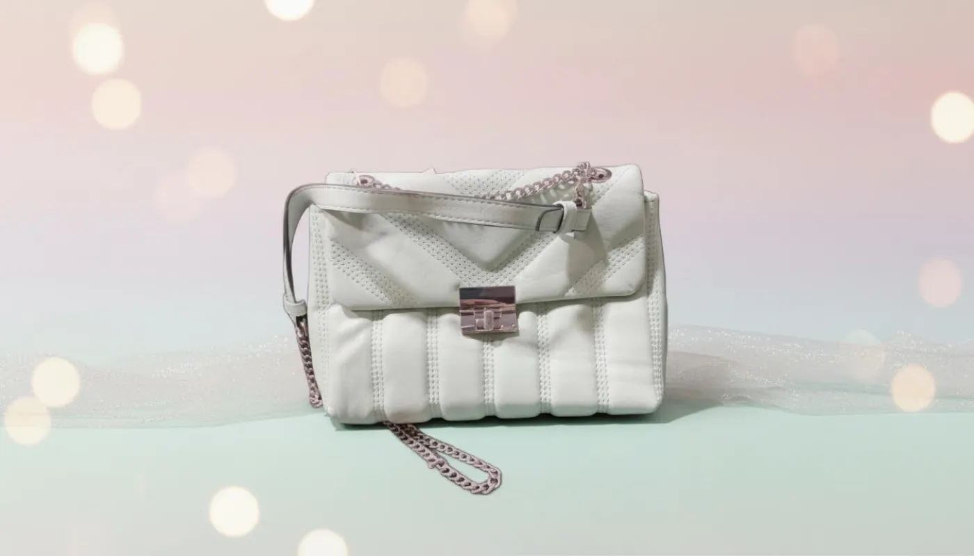 White Quilted Shoulder Bag with Chain Strap sold by Charming Charlie
