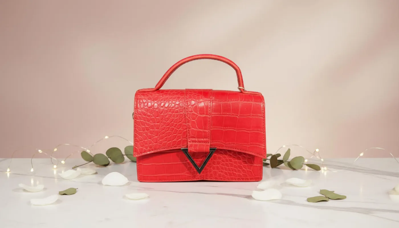 Red Crocodile-Textured Top-Handle Bag sold by Charming Charlie