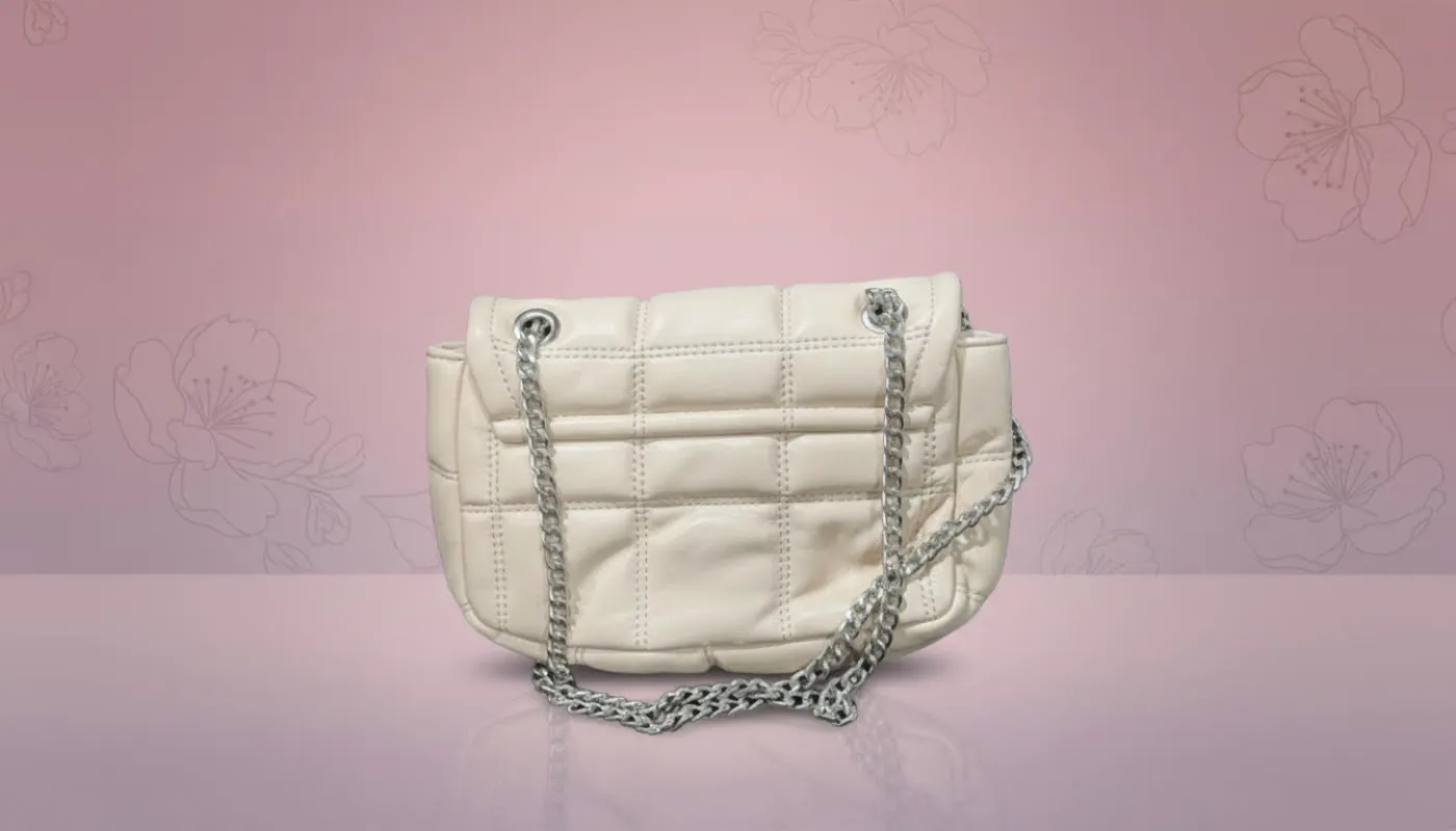 Chic Quilted Cream Bag with Silver Chain sold by Charming Charlie