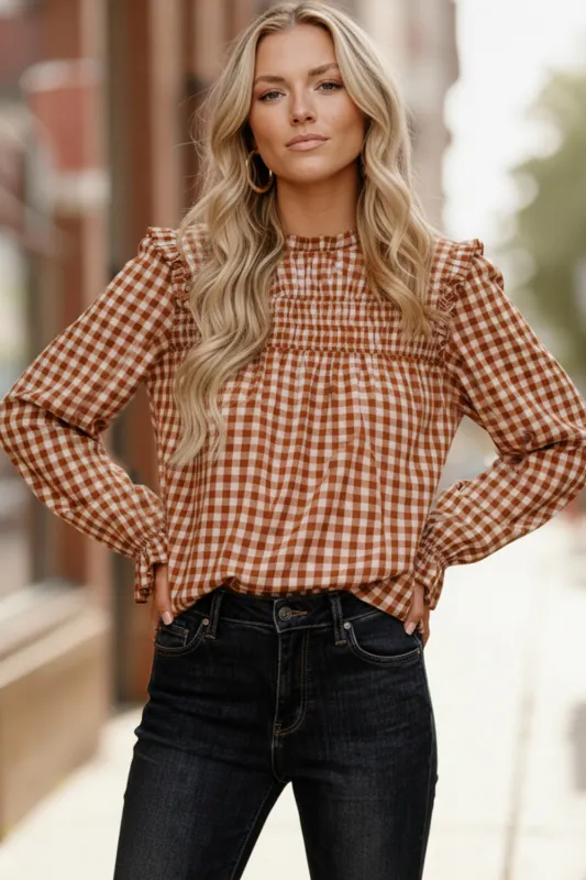 Checkmate Charm Blouse sold by Charming Charlie