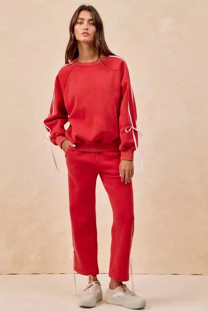 BiBi Side Lined Bow Details Fleece Sweatshirt sold by Charming Charlie product image thumbnail 5