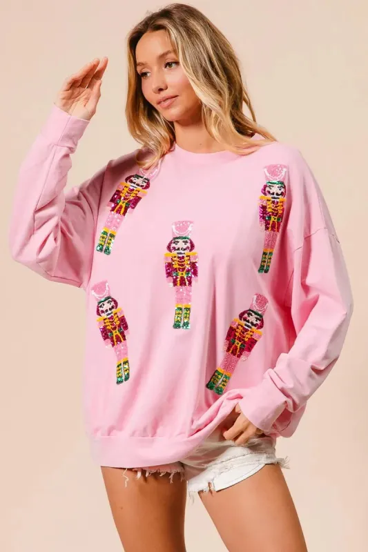BiBi Sequin Nutcrackers Embroidery Christmas Sweatshirt sold by Charming Charlie