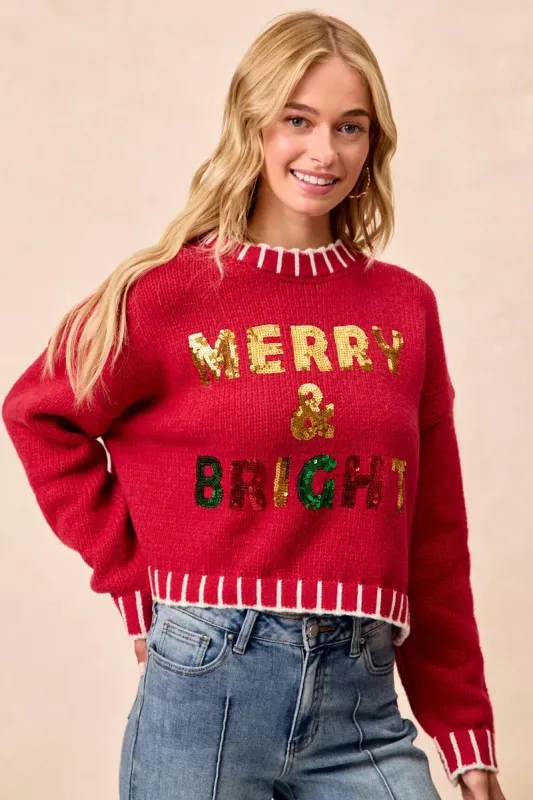 BiBi Christmas Theme Sequin Lattering Sweater sold by Charming Charlie