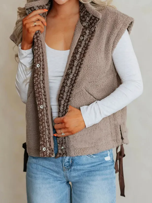 Side Bows Sherpa Fleece Vest sold by Charming Charlie