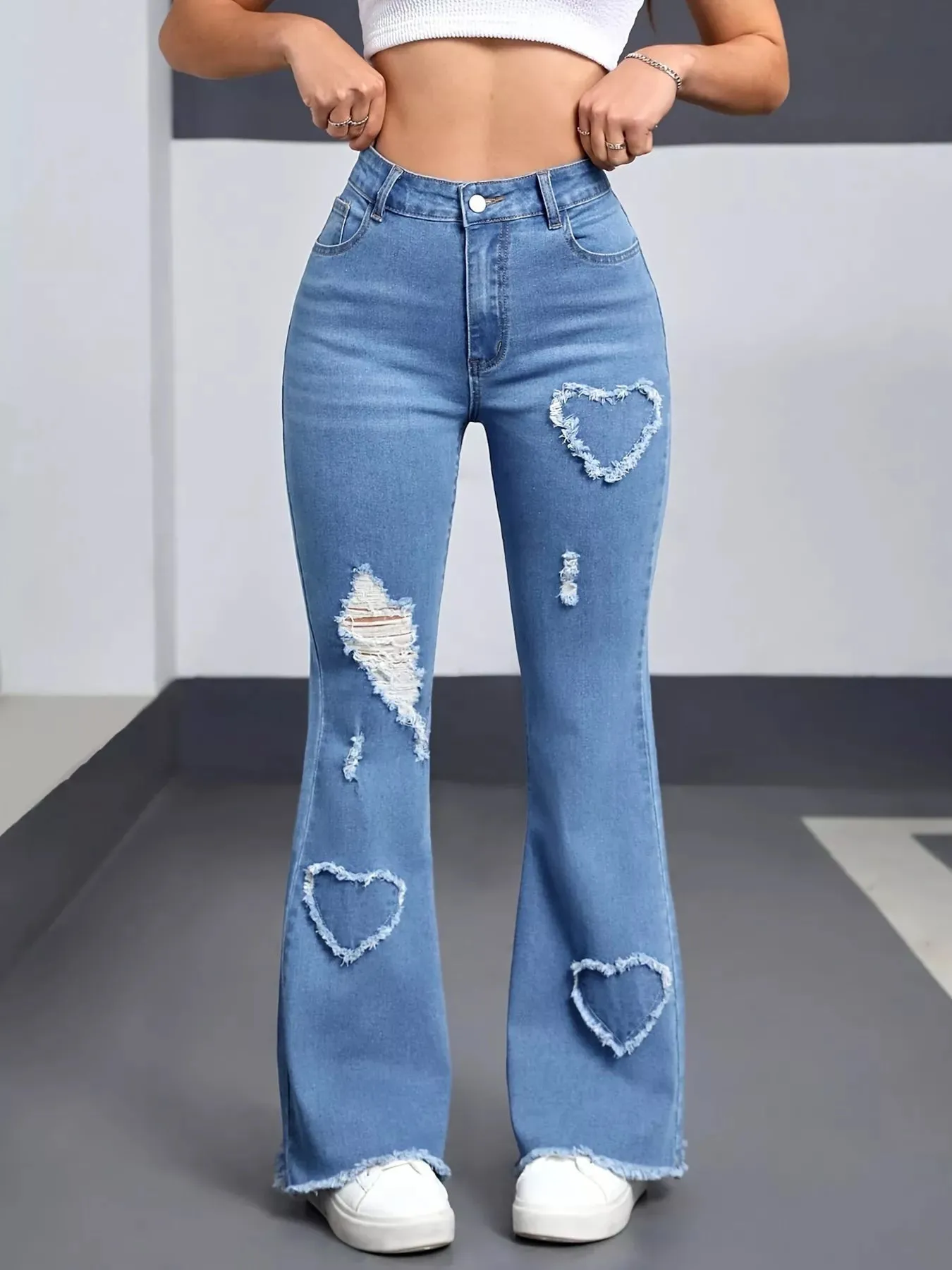 Heart Distressed Flare Jeans sold by Charming Charlie