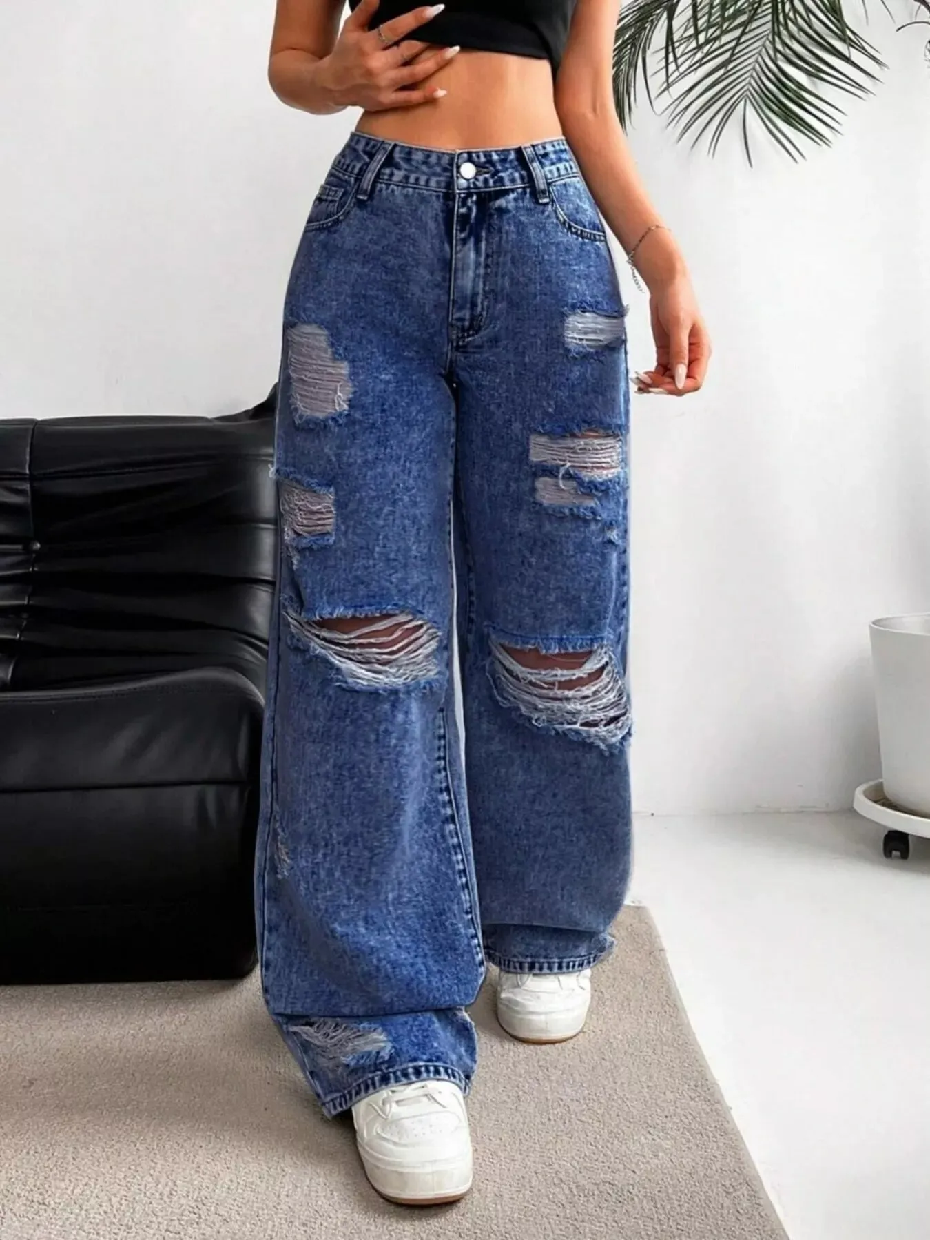 Distressed Wide Leg Jeans sold by Charming Charlie