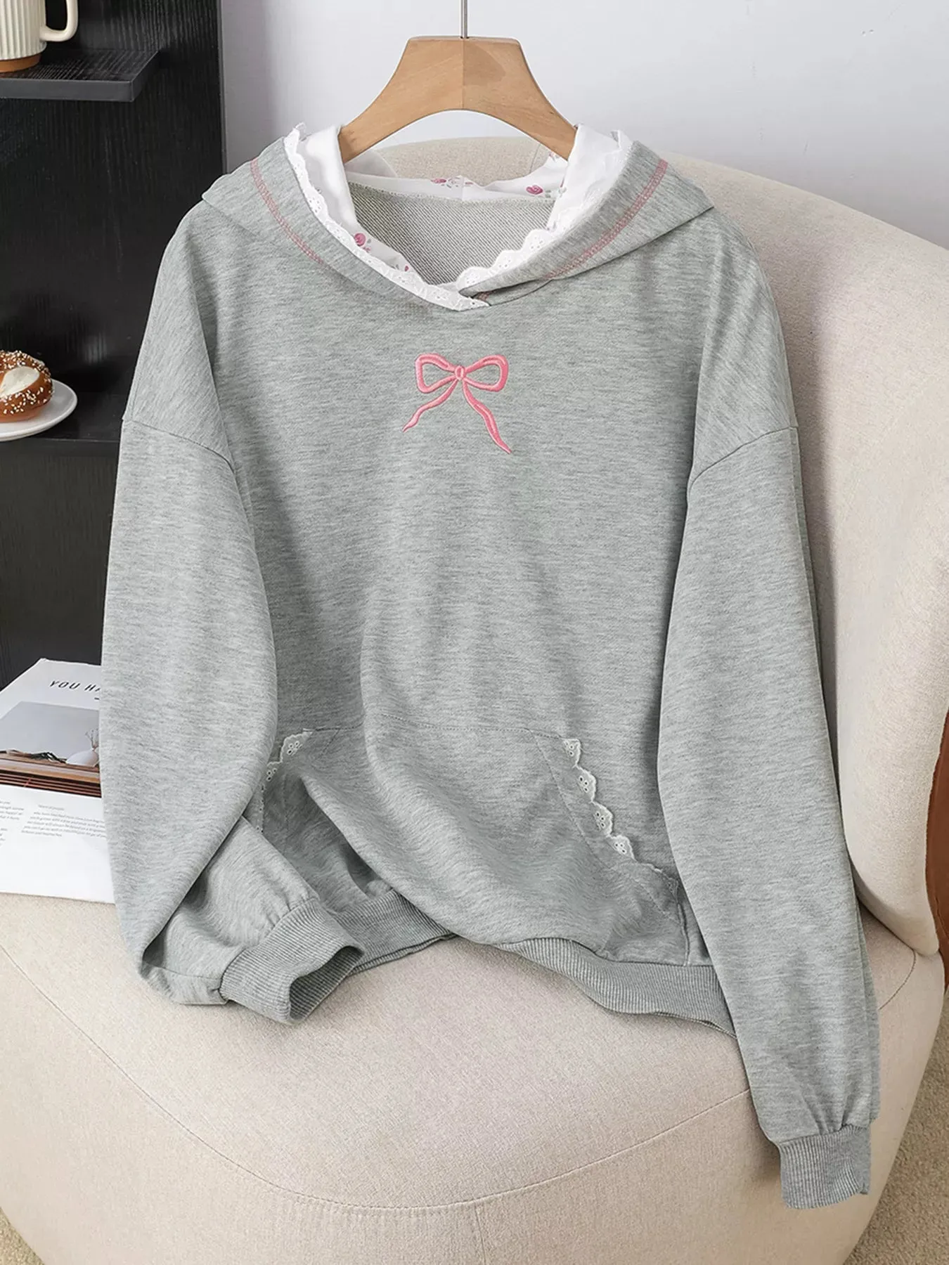Bow Embroidered Long Sleeve Hoodie sold by Charming Charlie