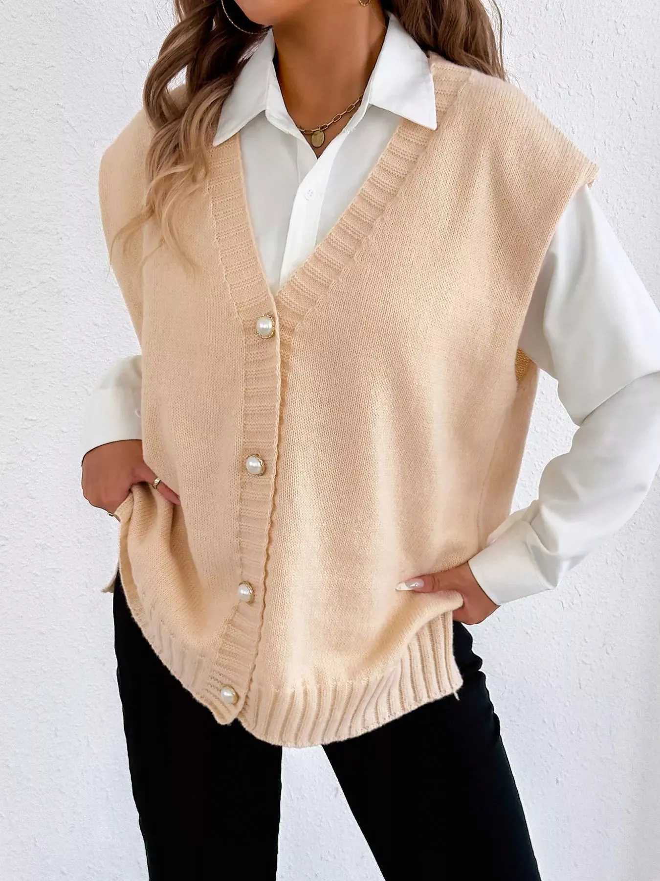 Button-Down Button Up Sweater Vest sold by Charming Charlie