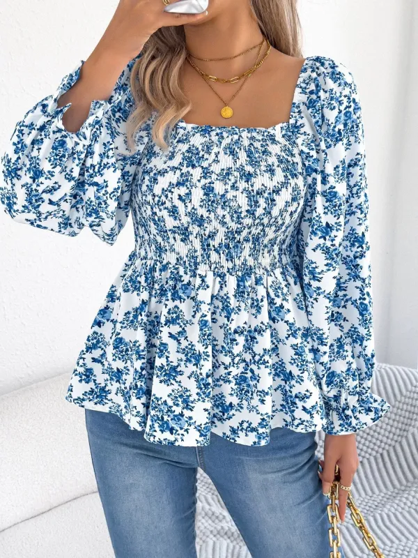 Full Size Floral Print Smocked Long Sleeve Blouse Plus Size sold by Charming Charlie