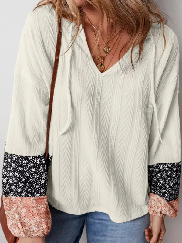 Floral Patchwork Textured Knit Drawstring V Neck Blouse sold by Charming Charlie