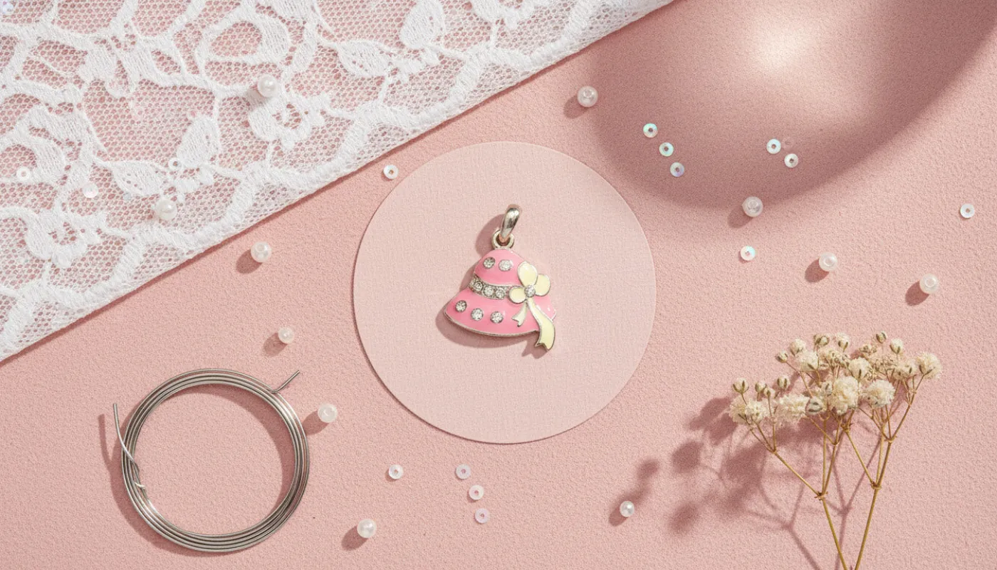 Pink Bell Charm sold by Charming Charlie