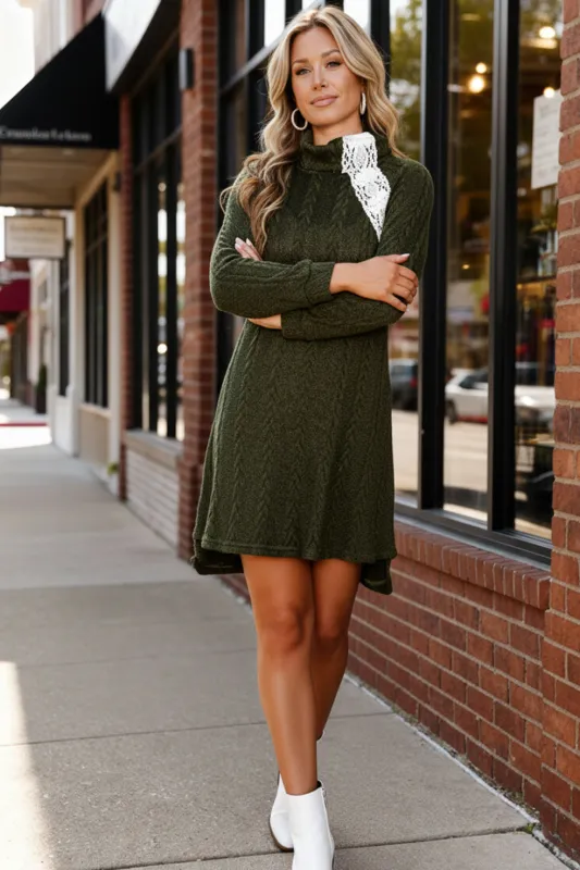 The Evergreen Lace Sweater Tunic sold by Charming Charlie