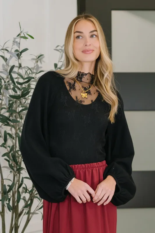 Short But Sweet Shrug in Black sold by Charming Charlie