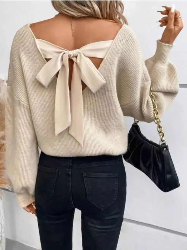 Back Bow V-Neck Sweater sold by Charming Charlie