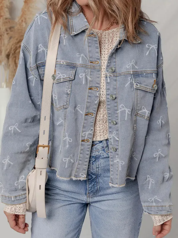 Bow Knot Print Light Wash Raw Hem Denim Jacket sold by Charming Charlie