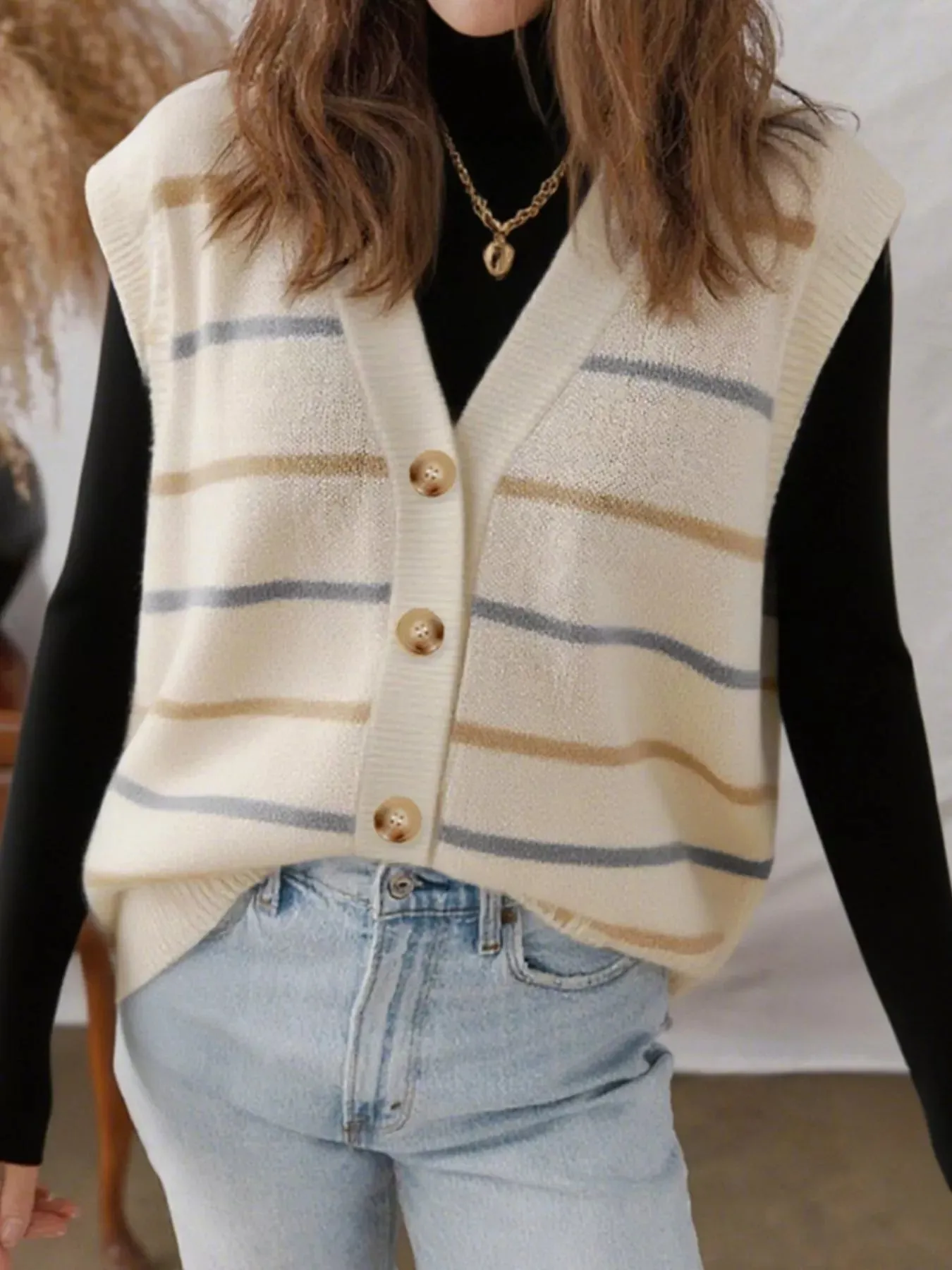 Striped Button-Down Sweater Vest sold by Charming Charlie