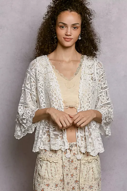 POL Floral Lace Short Sleeve Crochet Cardigan with Tassel Tie sold by Charming Charlie