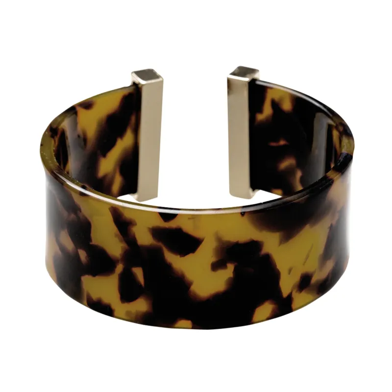 Tortoise Wide Cuff Bracelet sold by Charming Charlie
