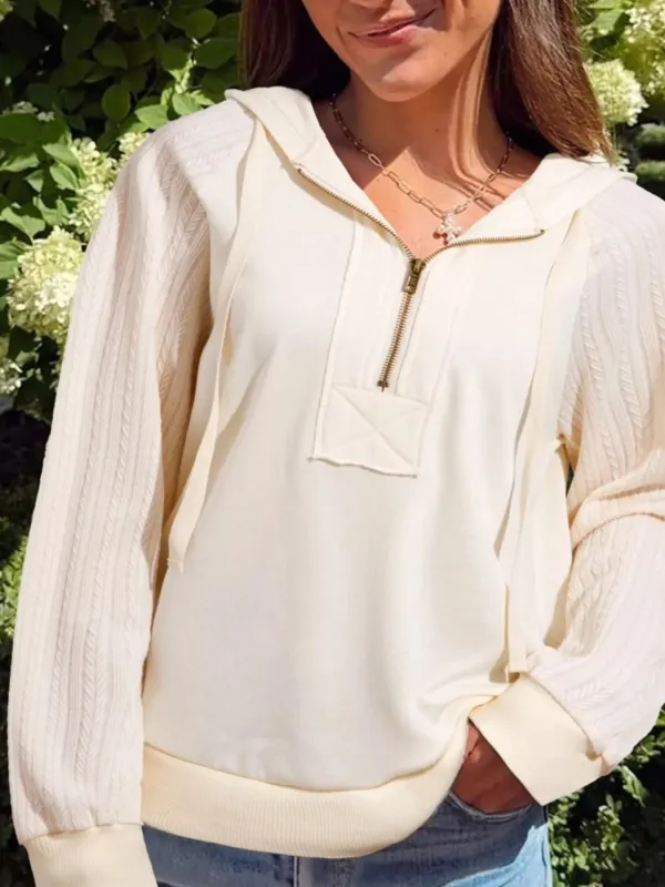 Solid Color Textured Sleeve Patchwork Half Zip Hoodie sold by Charming Charlie