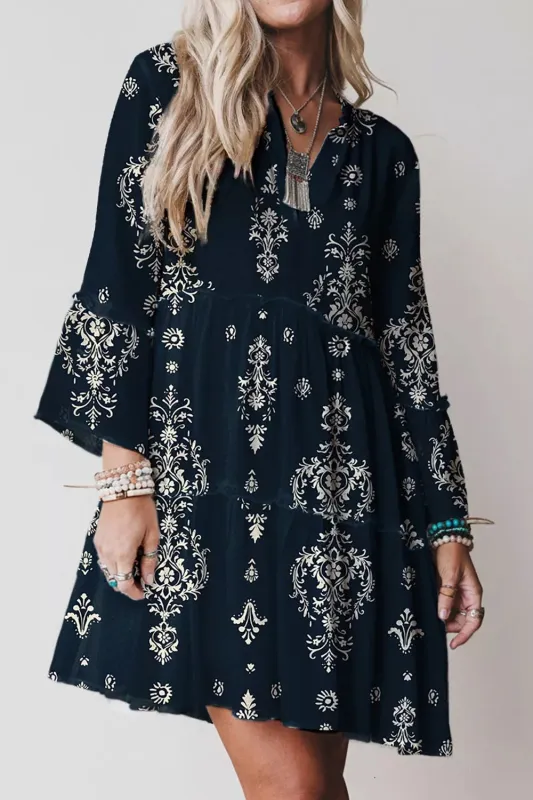 Printed Long Sleeve Tiered Mini Dress sold by Charming Charlie