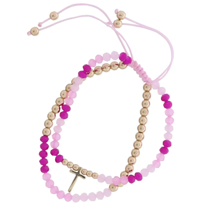 2 Strand Pinks, Gold Beaded Pully Adj. Bracelet with Gold Cross sold by Charming Charlie