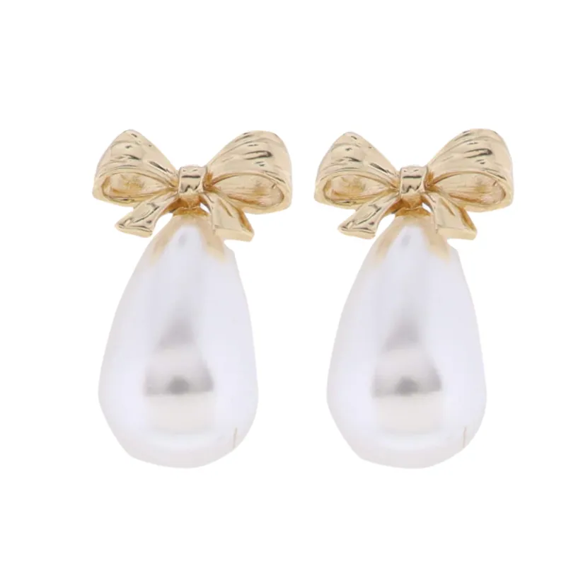 Gold Bow Earring with Pearl Teardrop sold by Charming Charlie