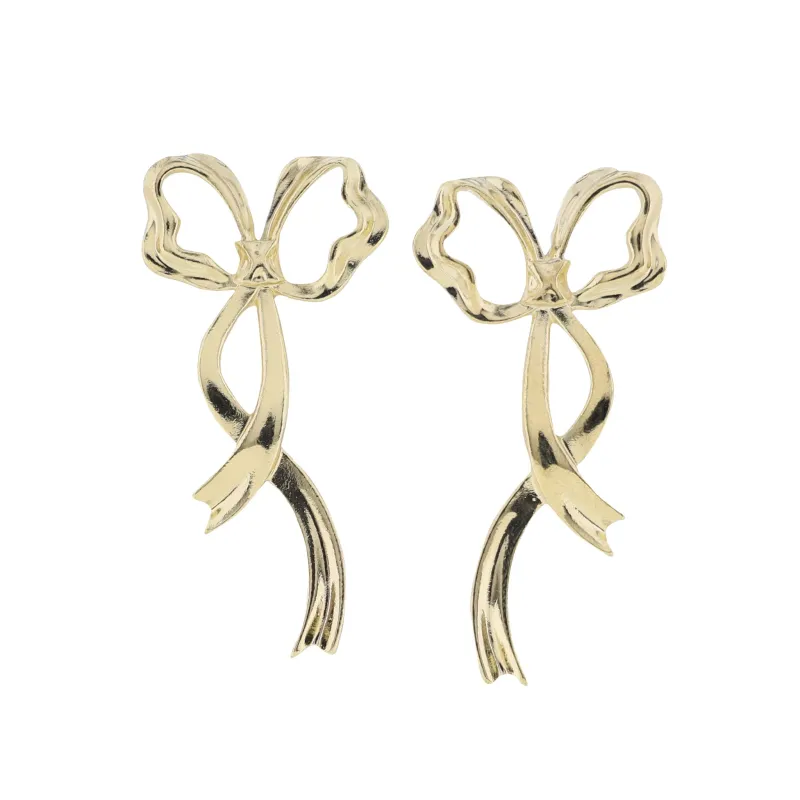 Gold Flowing Bow Earring sold by Charming Charlie