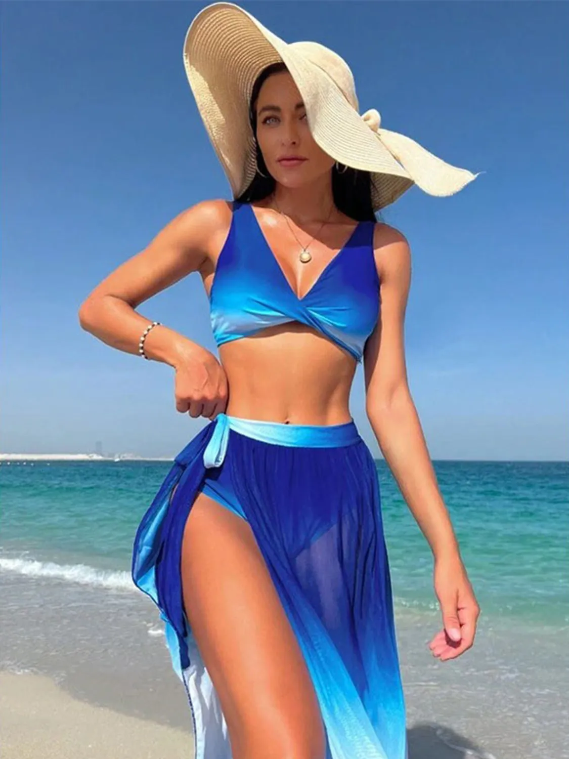 Twisted Gradient Wide Strap Three-Piece Swim Set sold by Charming Charlie