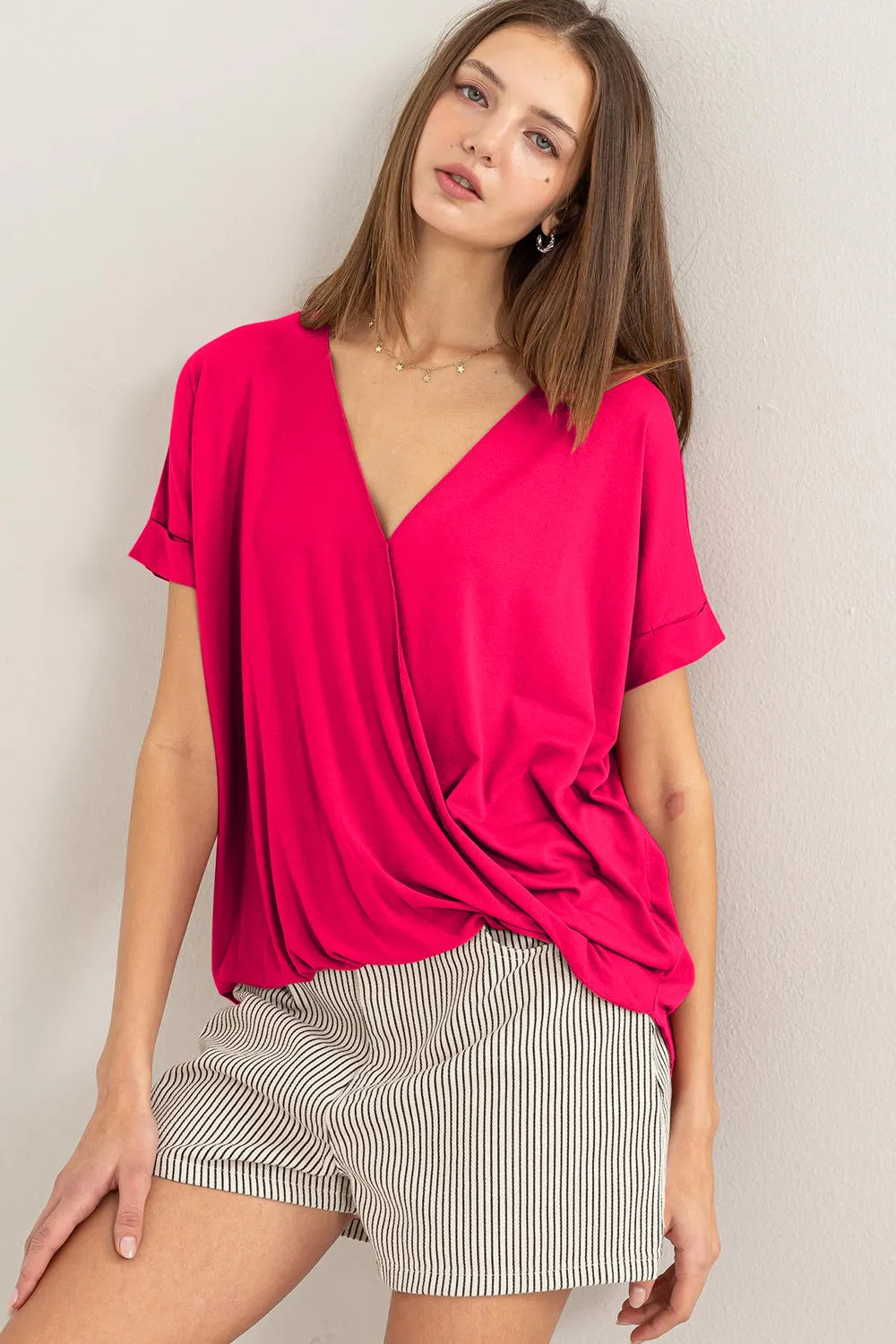 HYFVE Short Sleeve Surplice Top sold by Charming Charlie