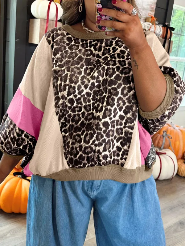 Leopard Print Color Block Round Neck Top sold by Charming Charlie