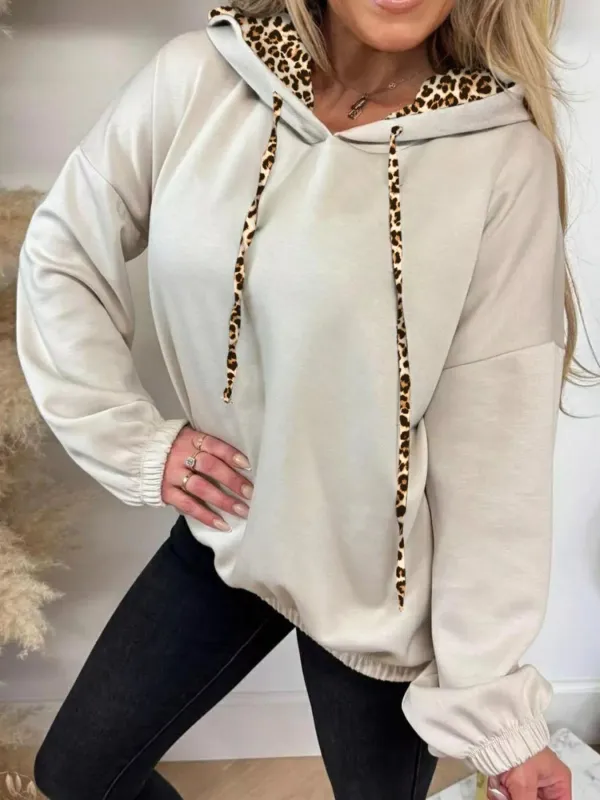 Leopard Trim Drawstring Long Sleeve Hoodie sold by Charming Charlie